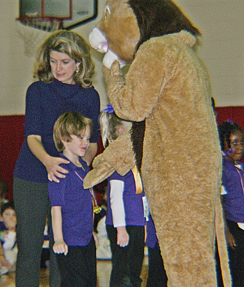 Levi receiving awards at school.